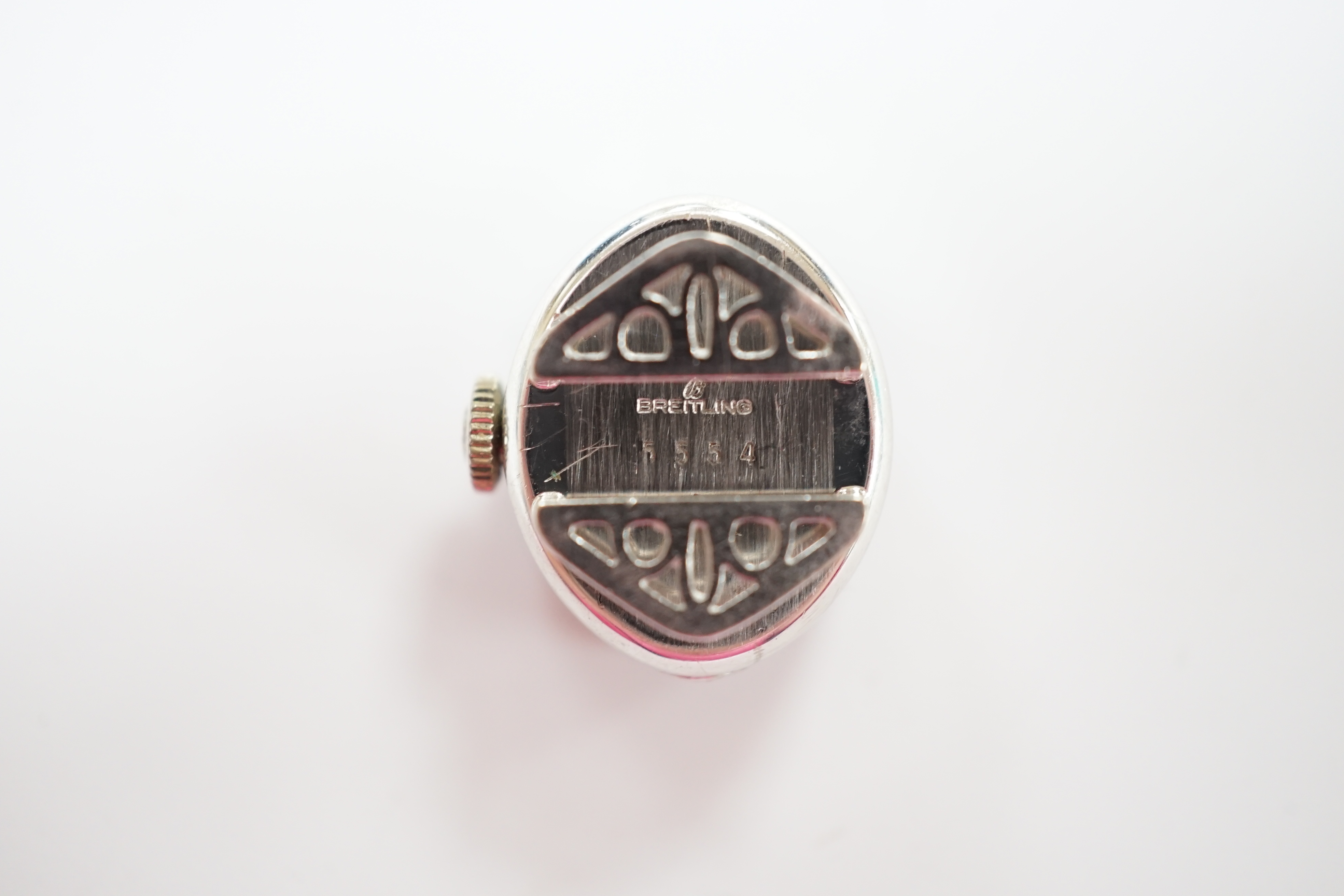 A lady's 18k white metal Breitling manual wind wrist watch, the case back numbered 5554, case diameter 15mm.